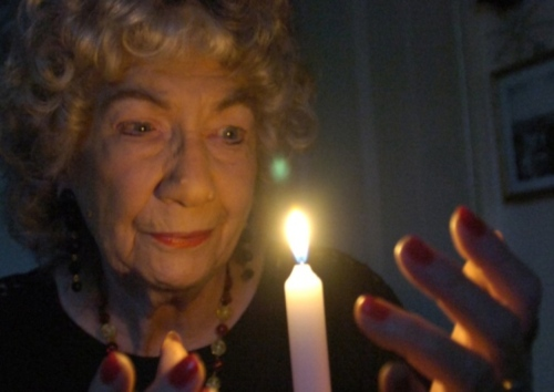 Patricia gazing into candle