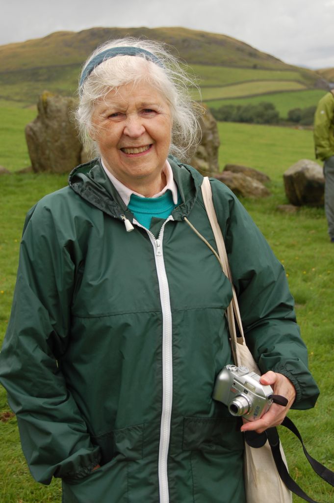 Jean at stone cirlce with camera