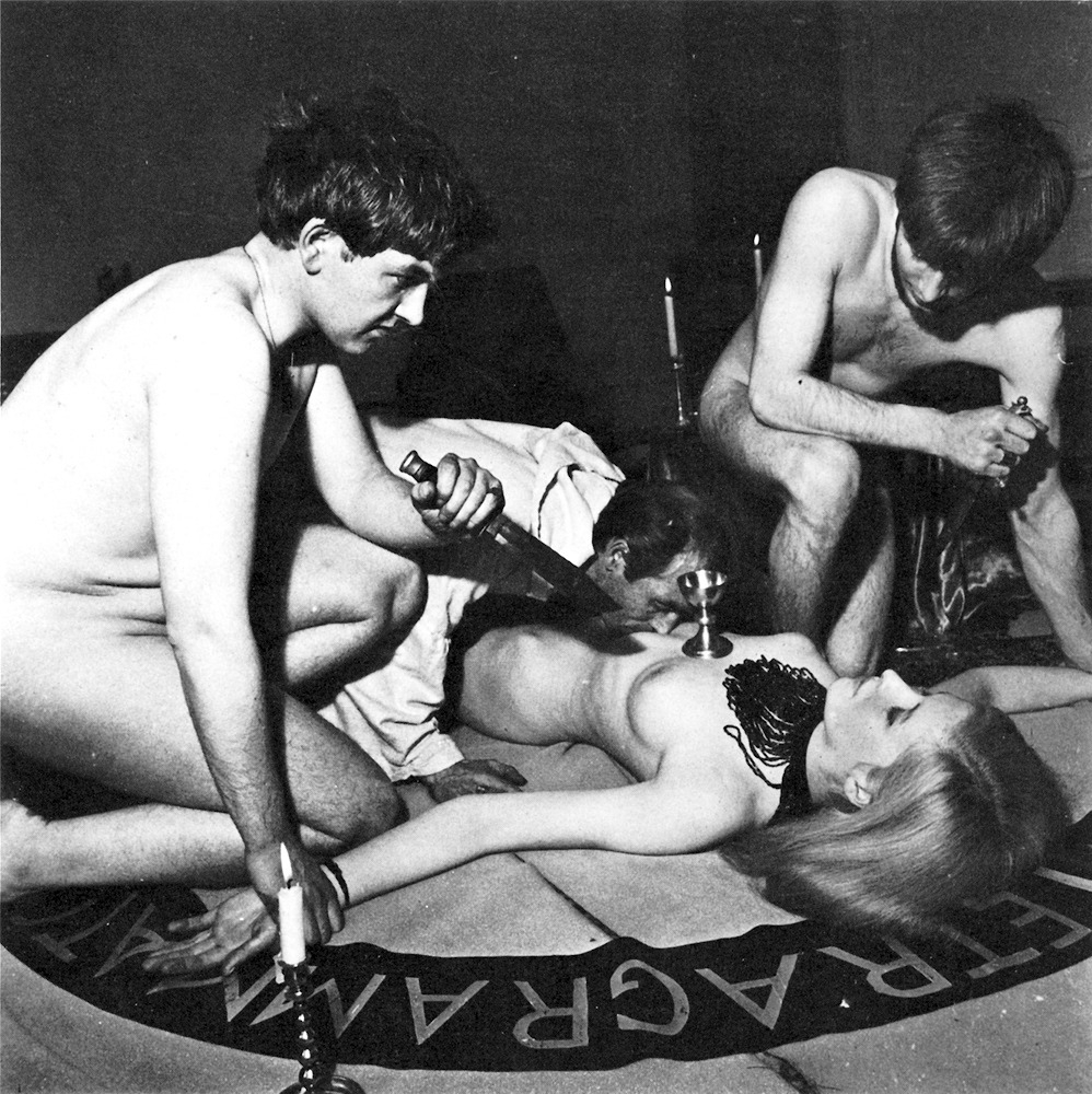 maxine-laid-down-with-coven-members-preforming-rite