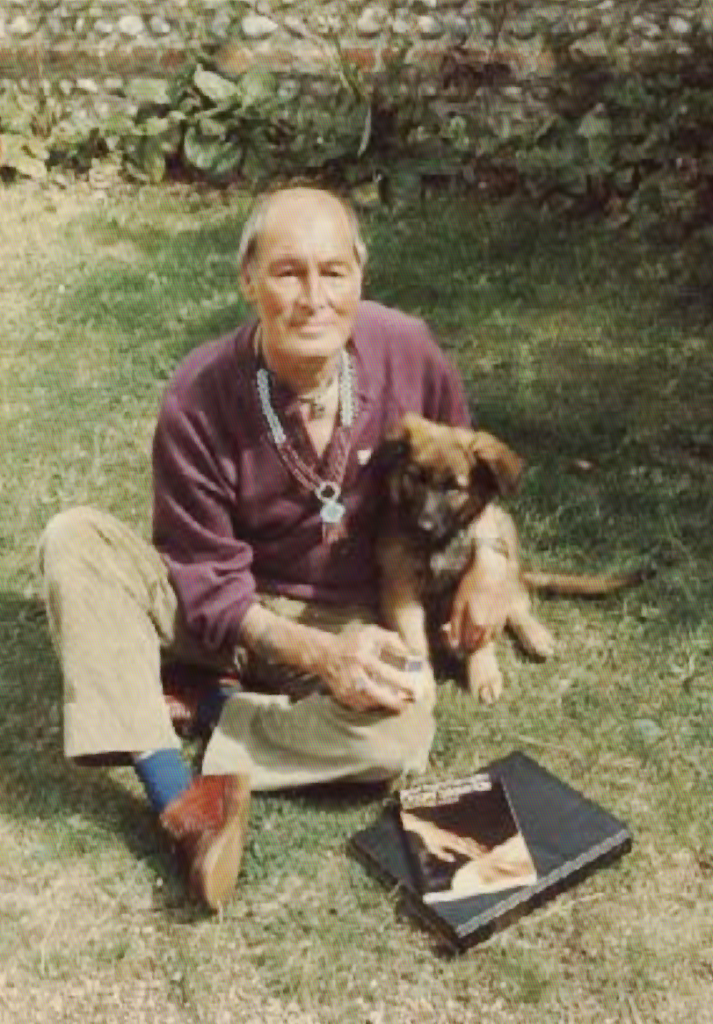 Alex-old-with-dog-and-books