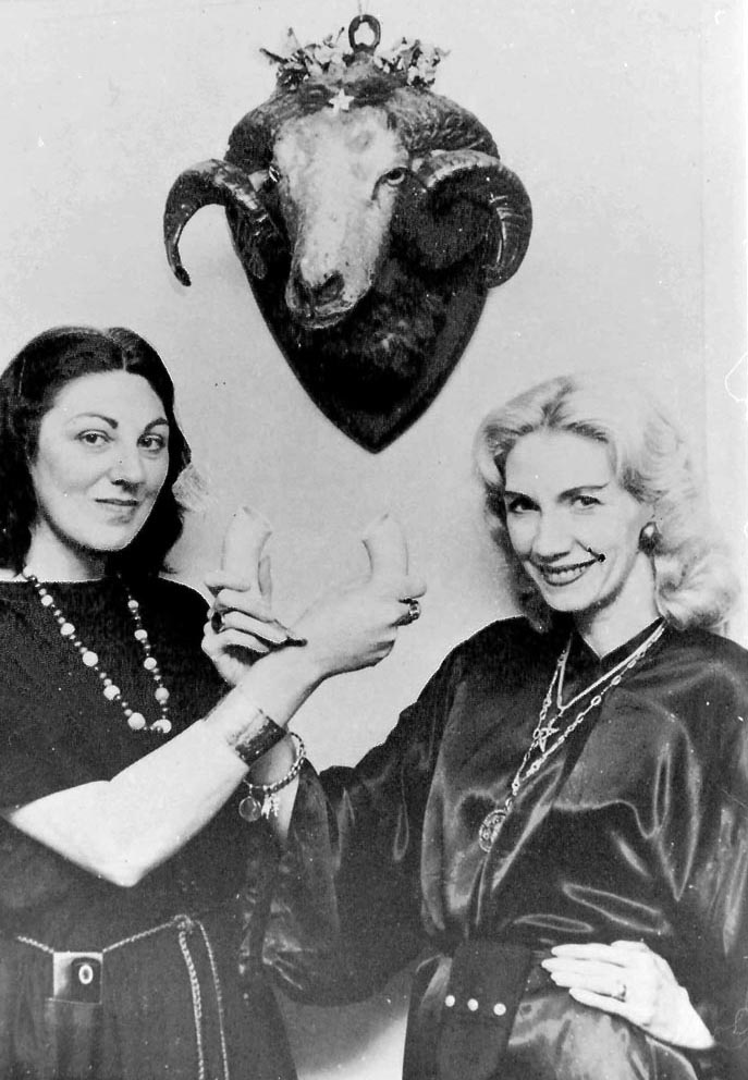 Patricia and Doreen holding horned cups with ram head