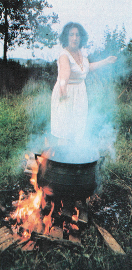 EB throwing into cauldron in outoor ritual